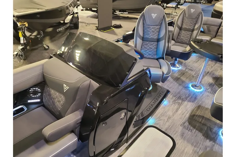 Slide: The Image of Interior of 2026 Viaggio Diamante 24Q Tritoon with luxurious seating. - 7