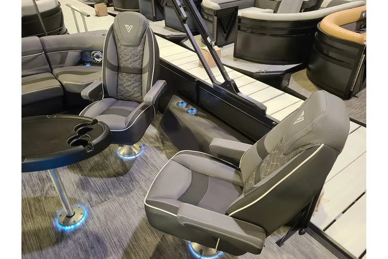 Slide: The Image of Interior of 2026 Viaggio Diamante 24Q Tritoon with luxurious seating. - 8