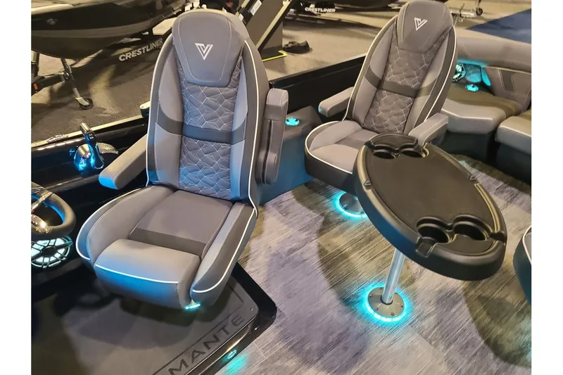 Slide: The Image of Interior of 2026 Viaggio Diamante 24Q Tritoon with luxurious seating. - 9