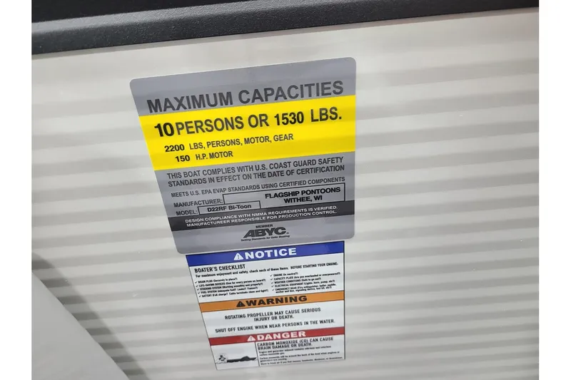 Slide: The Image of Safety label for Flagship Discover D22RF boat, maximum capacity 10 persons. - 22