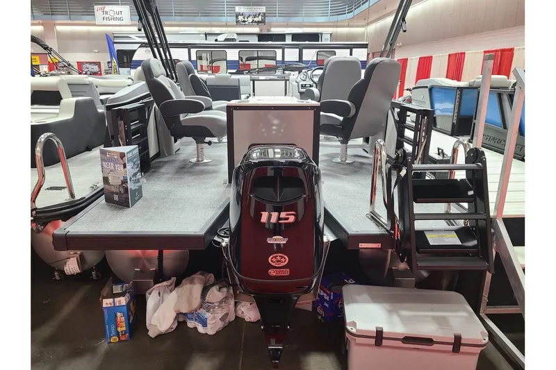 Slide: The Image of Flagship Discover D22RF 2026 with 115 HP motor at boat show. - 3