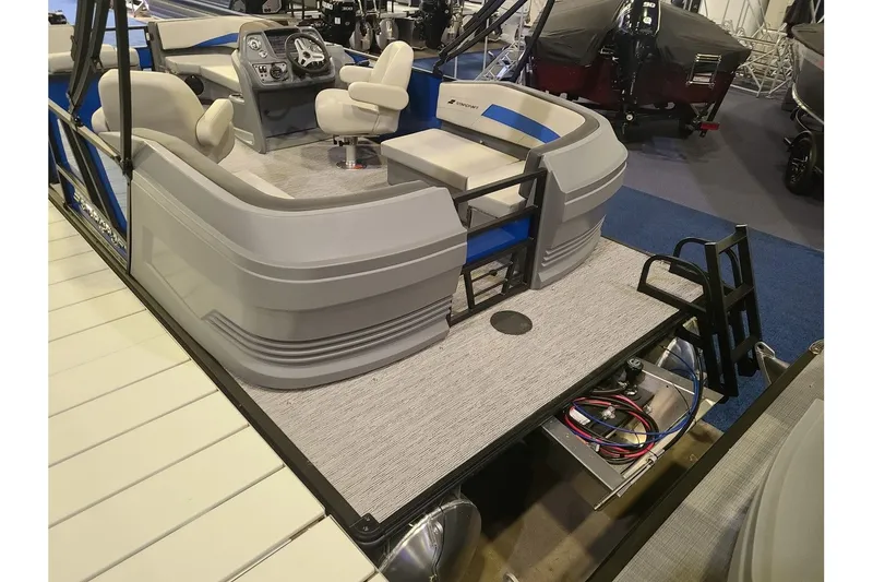 Slide: The Image of Starcraft GX 20 R DH 2026 pontoon boat interior with helm console and seating area. - 5