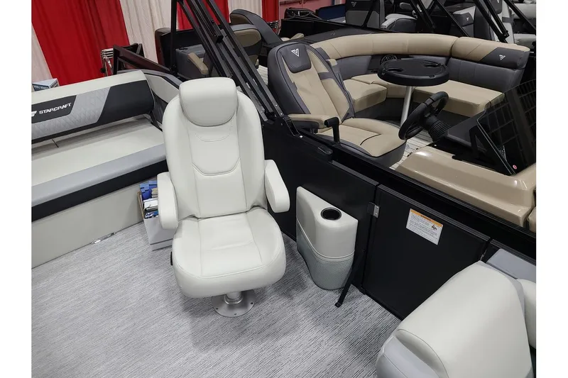 Slide: The Image of 2026 Starcraft VX 22Q DH boat interior with seating. - 7