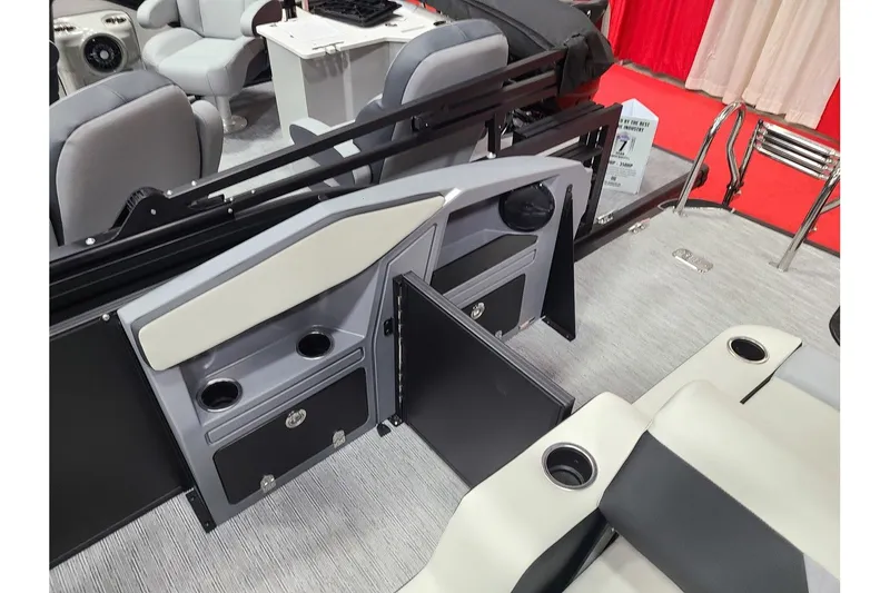 Slide: The Image of Interior of 2026 Starcraft VX 22Q DH with seating and cup holders. - 9