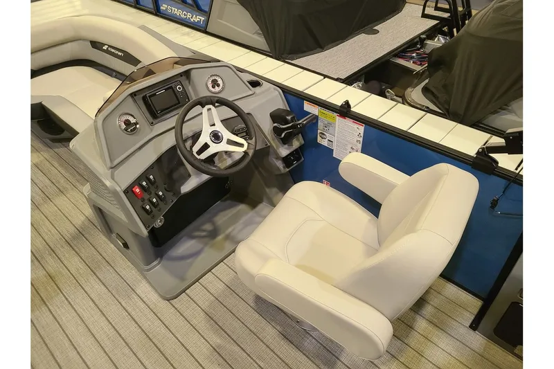 Slide: The Image of Interior of 2026 Starcraft VX 20FD with steering console and seat. - 13