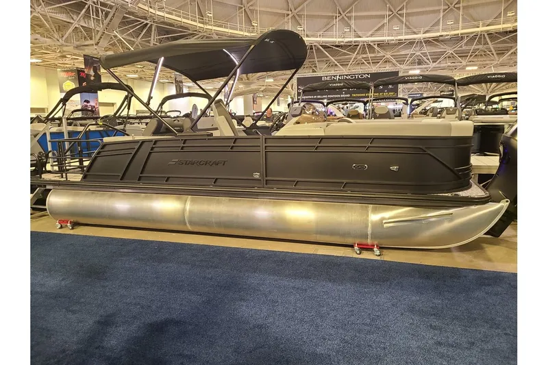 The Image of Starcraft EXS 3 DL 2026 pontoon boat displayed at a show. - 1