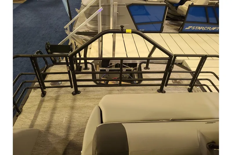 Slide: The Image of Starcraft EXS 3 DL 2026 pontoon boat deck with railing. - 11
