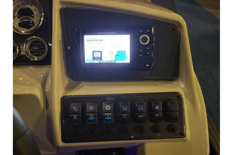 Slide: The Image of Dashboard of 2026 Starcraft EXS 3 DL with navigation system. - 16