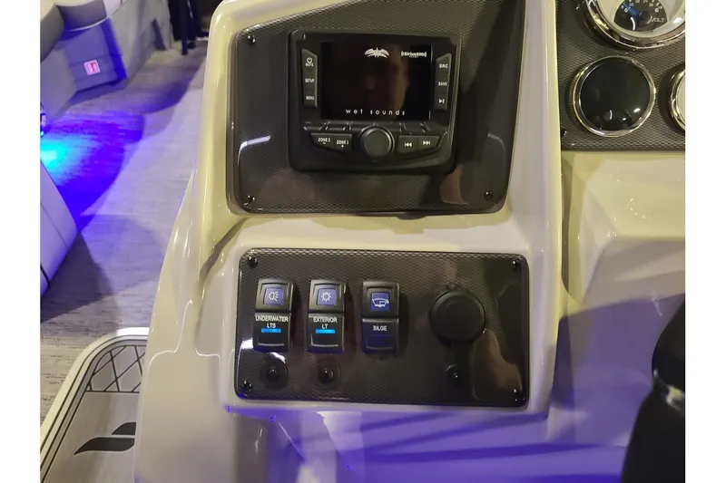 Slide: The Image of Dashboard of 2026 Starcraft EXS 3 DL with controls and display. - 18