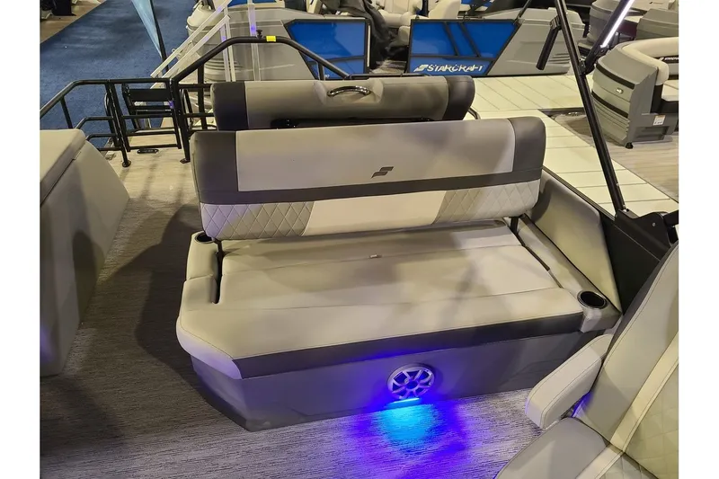 Slide: The Image of Starcraft EXS 3 DL 2026 boat seat with blue LED lighting. - 7