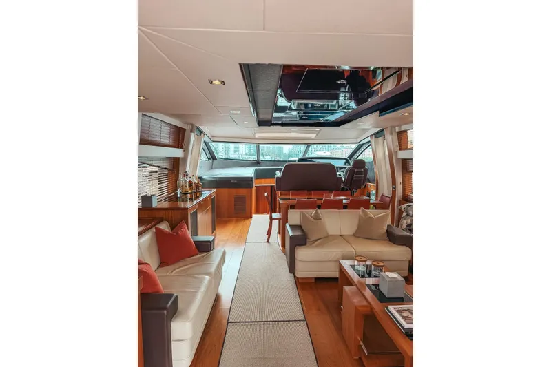 Slide: The Image of Luxury Sunseeker Predator 84 yacht docked, showcasing sleek design and modern amenities. - 10