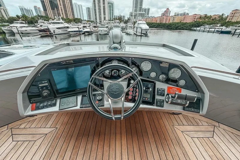 Slide: The Image of Luxurious interior of 2010 Sunseeker Predator 84 yacht with elegant seating and dining area. - 12