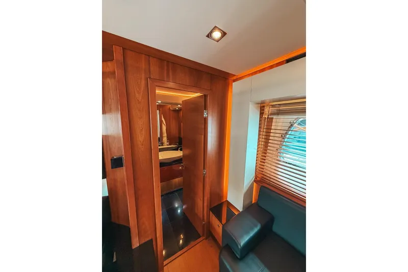 Slide: The Image of Luxurious bedroom interior of 2010 Sunseeker Predator 84 yacht with modern furnishings. - 25