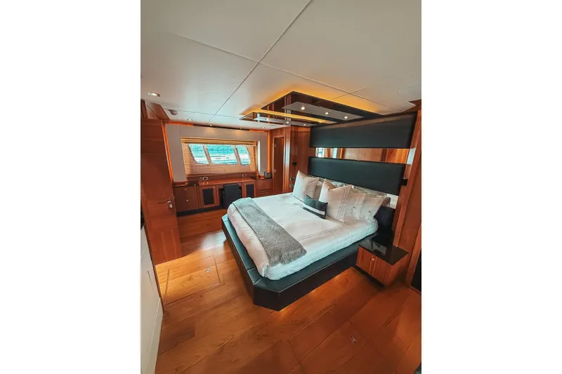 Slide: The Image of Luxurious interior of 2010 Sunseeker Predator 84 yacht with wood accents and modern furnishings. - 26