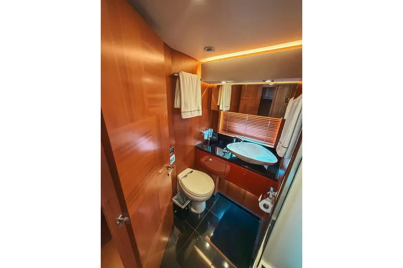 Slide: The Image of Luxurious bathroom in 2010 Sunseeker Predator 84 yacht with modern fixtures and elegant design. - 32