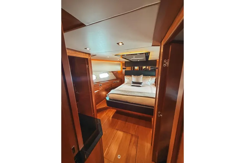 Slide: The Image of Luxurious interior of 2010 Sunseeker Predator 84 yacht with elegant seating and dining area. - 34