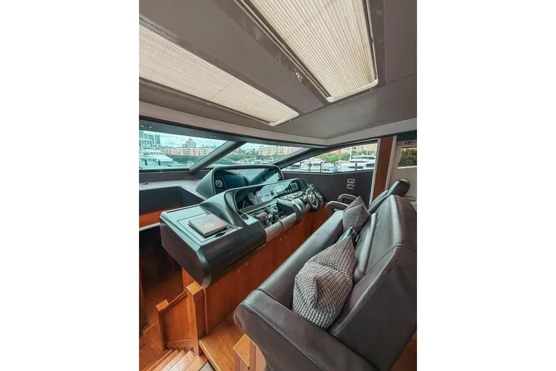 Slide: The Image of Luxurious interior of 2010 Sunseeker Predator 84 yacht cockpit with modern controls. - 36