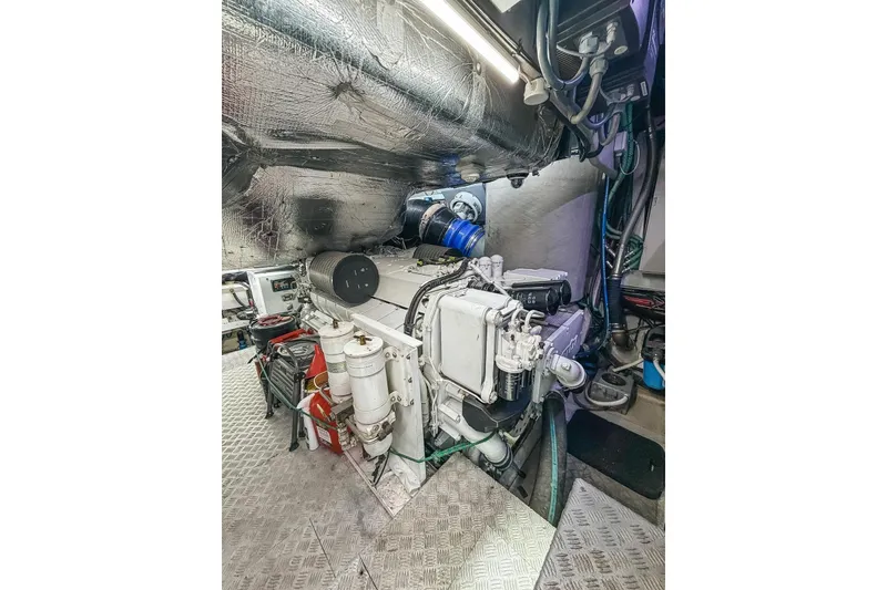 Slide: The Image of Engine room of 2010 Sunseeker Predator 84 yacht, showcasing machinery and equipment. - 45