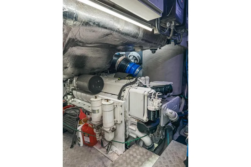 Slide: The Image of Engine room of 2010 Sunseeker Predator 84 yacht, showcasing mechanical components and equipment. - 46