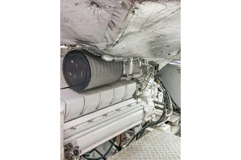 Slide: The Image of Engine room of 2010 Sunseeker Predator 84 yacht, showcasing mechanical components and equipment. - 47