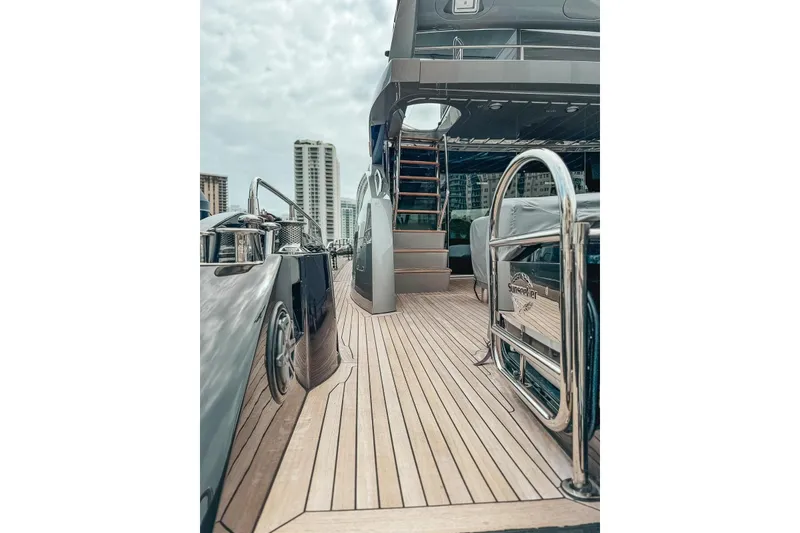 Slide: The Image of Luxurious Sunseeker Predator 84 yacht deck with covered seating, 2010 model. - 6