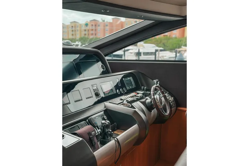 Slide: The Image of Luxurious 2010 Sunseeker Predator 84 yacht deck with sleek design and modern architecture. - 9