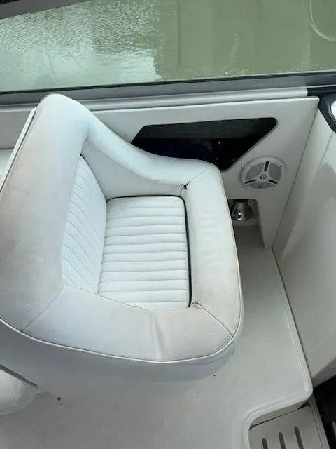 Slide: The Image of White seat on a 1993 Sea Ray 38 Express boat. - 13