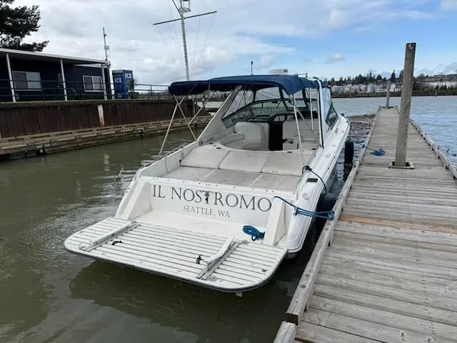 Slide: The Image of 1993 Sea Ray 38 Express boat docked in Seattle. - 2