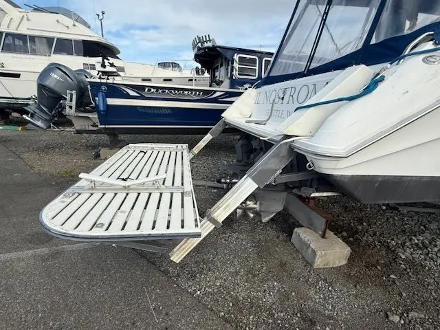 Slide: The Image of 1993 Sea Ray 38 Express on dry dock with swim platform. - 40