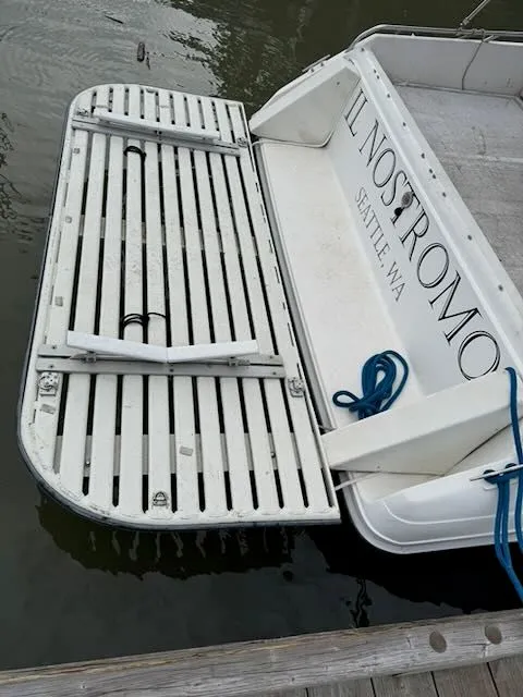 Slide: The Image of Stern of a 1993 Sea Ray 38 Express boat with swim platform. - 41