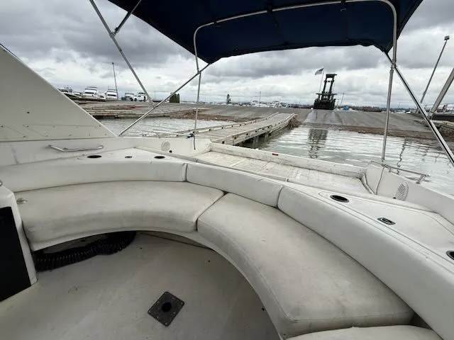 Slide: The Image of Interior view of a 1993 Sea Ray 38 Express yacht at the dock. - 7