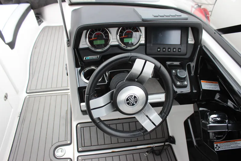 Slide: The Image of Steering console of 2017 Yamaha Boats 242 Limited S E-Series with modern controls and gauges. - 15