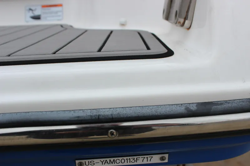 Slide: The Image of 2017 Yamaha Boats 242 Limited S E-Series swim platform detail with registration number. - 22