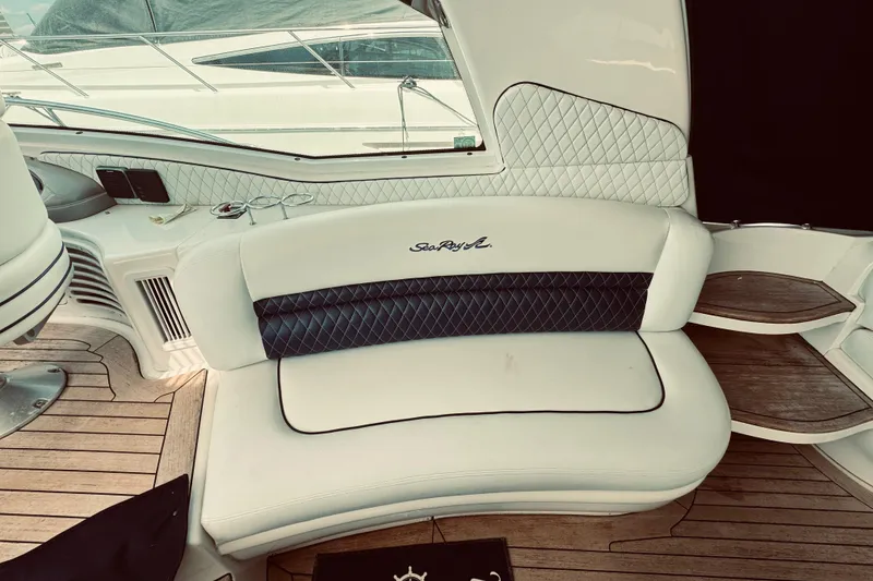Slide: The Image of Luxurious seating area on a 2005 Sea Ray 500 Sundancer yacht with elegant design. - 10