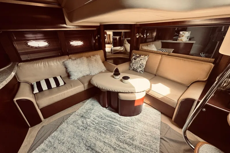 Slide: The Image of Luxurious interior of 2005 Sea Ray 500 Sundancer yacht with plush seating and elegant decor. - 20