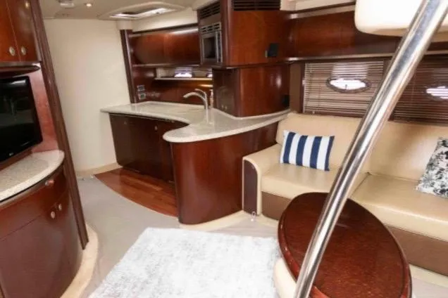 Slide: The Image of Luxurious interior of 2005 Sea Ray 500 Sundancer yacht with elegant wood finishes. - 22