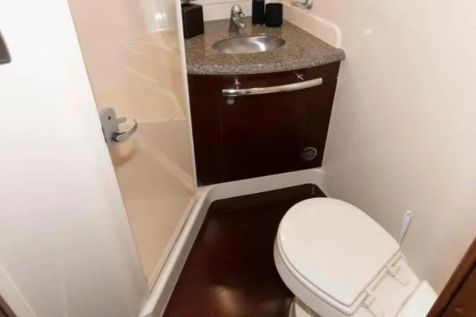 Slide: The Image of Bathroom interior of 2005 Sea Ray 500 Sundancer yacht with shower and sink. - 27