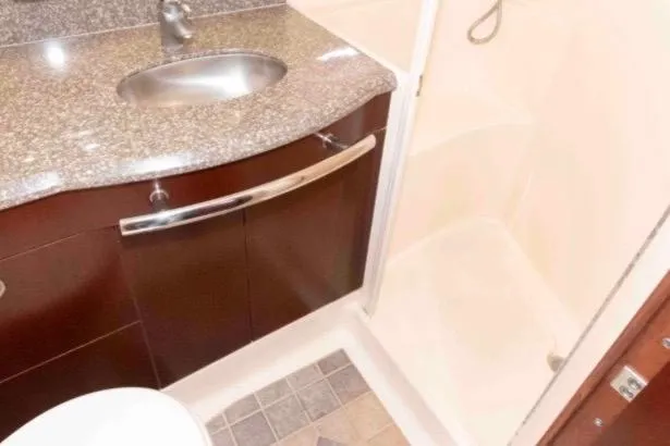 Slide: The Image of Luxurious bathroom in 2005 Sea Ray 500 Sundancer yacht with granite countertop. - 28