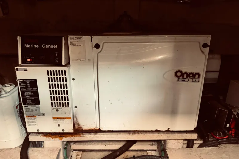 Slide: The Image of Marine generator in a 2005 Sea Ray 500 Sundancer engine room. - 34