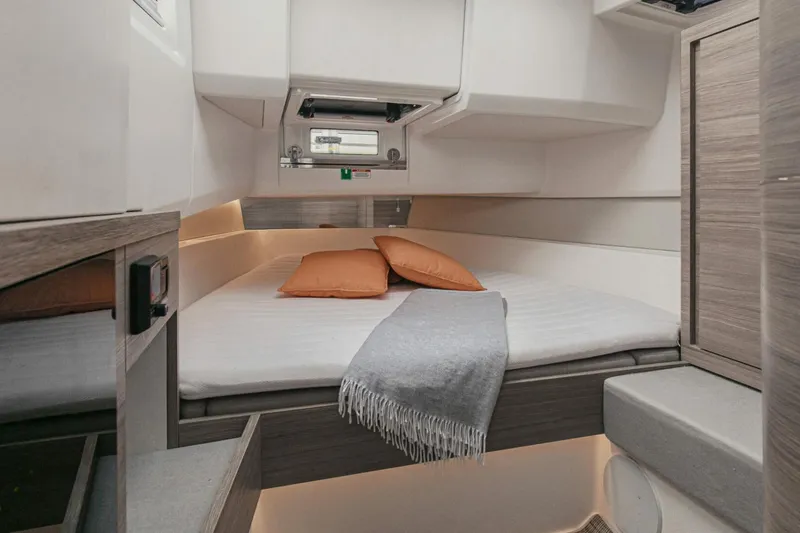 Slide: The Image of Cozy cabin interior of 2026 Saxdor 400 GTC with modern bedding and soft lighting. - 4