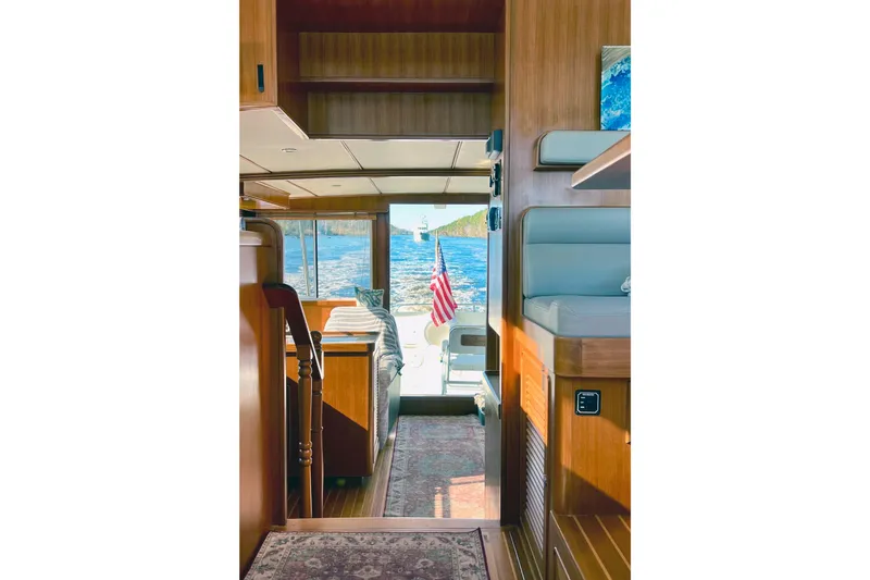 Slide: The Image of 2016 Helmsman Trawlers 38 Pilothouse for sale - Pilothouse Looking Aft / Salon / Cockpit - Owner Provided - 11