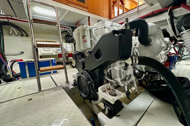 Slide: The Image of Engine room of 2016 Helmsman Trawlers 38 Pilothouse, showcasing machinery and equipment. - 29