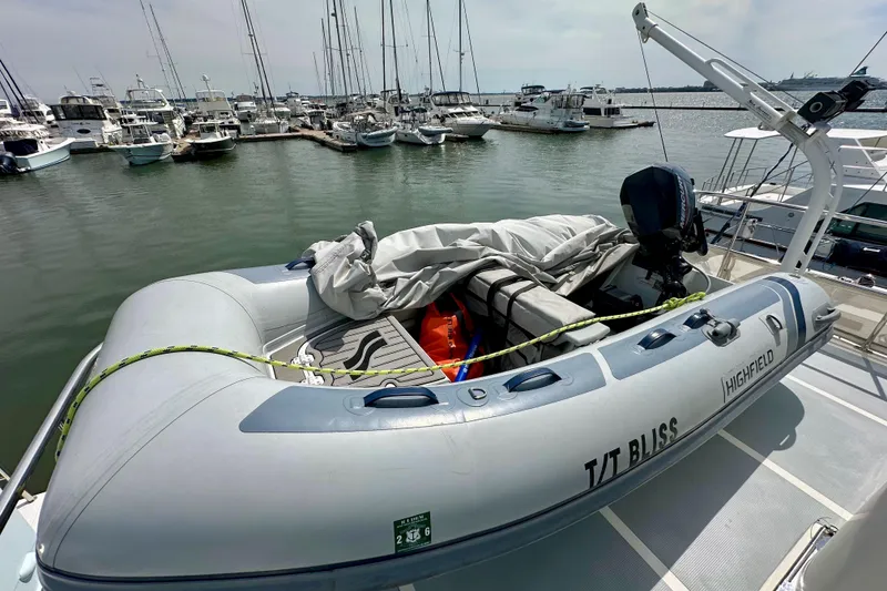 Slide: The Image of Inflatable boat on Helmsman Trawlers 38 Pilothouse, 2016, docked at marina. - 37