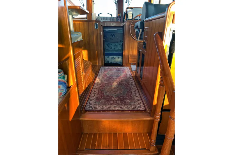 Slide: The Image of 2016 Helmsman Trawlers 38 Pilothouse for sale - Looking Forward Pilothouse / Owner's Suite - Owner Provided - 6