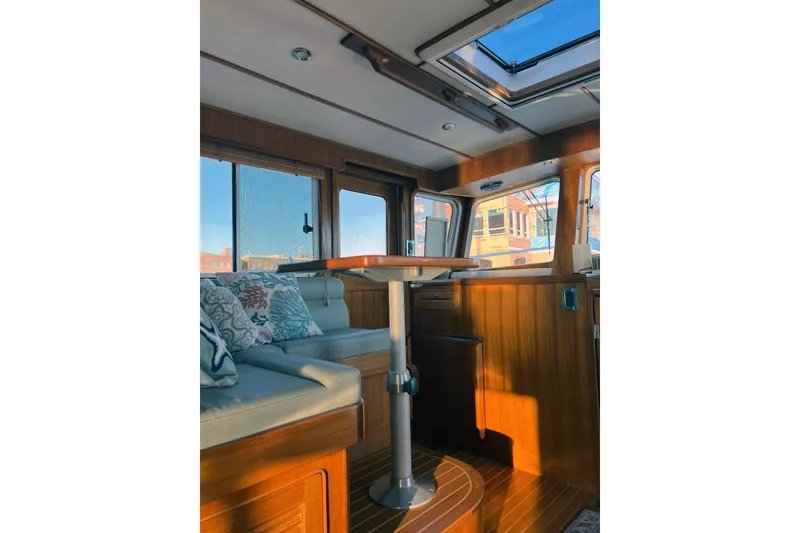 Slide: The Image of 2016 Helmsman Trawlers 38 Pilothouse for sale - Pilothouse Companion Seating - Owner Provided - 7