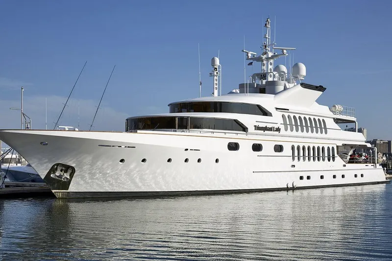 The Image of Sterling Yachts 155 Motor Yacht, 1985, docked in a marina under clear blue skies. - 0