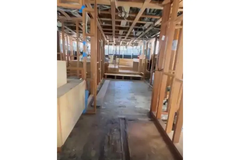 Slide: The Image of Interior construction of 1985 Sterling Yachts 155 Motor Yacht, showcasing wooden framework. - 15