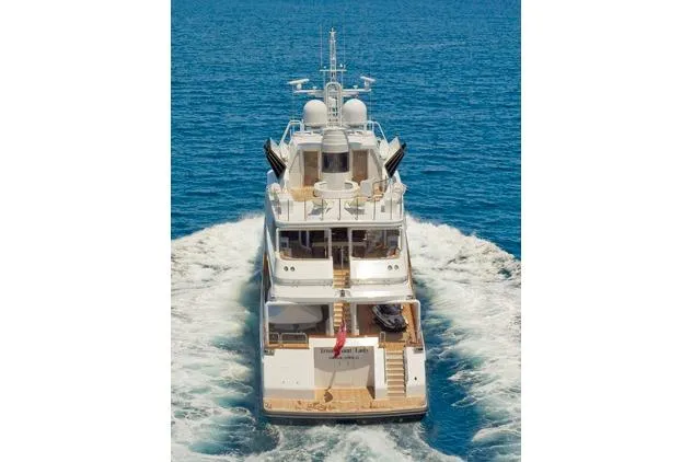 Slide: The Image of Sterling Yachts 155 Motor Yacht cruising on open sea, rear view, 1985 model. - 24