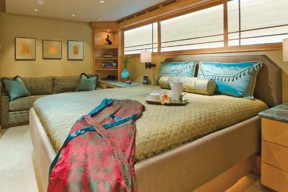 Slide: The Image of Luxurious bedroom interior on 1985 Sterling Yachts 155 Motor Yacht, featuring elegant decor and cozy ambiance. - 9