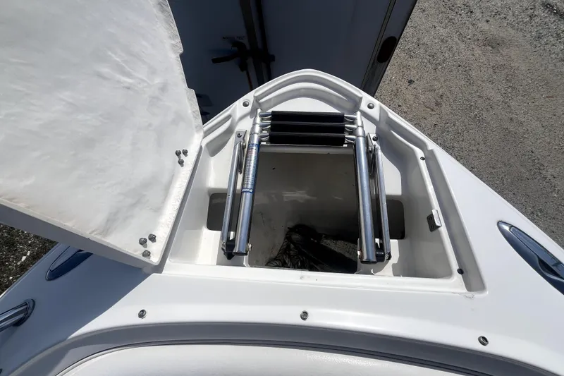 Slide: The Image of Open hatch with ladder on 2011 Monterey 254FSC boat deck. - 31